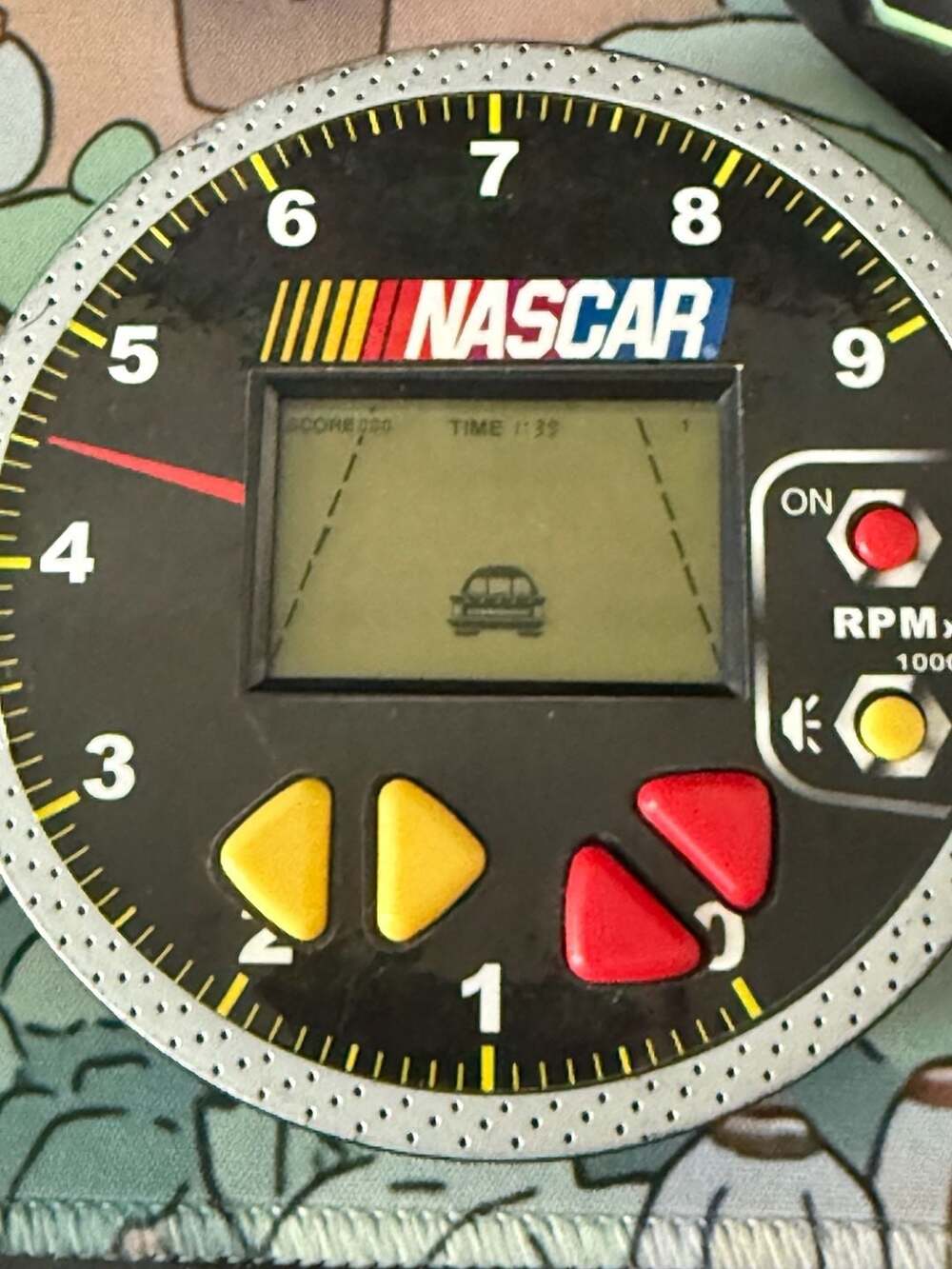 NASCAR electronic hand held racing game Techno Source 2005
